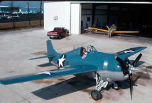 Roy in the cockpit of a BSA restored F4F-3 Wildcat